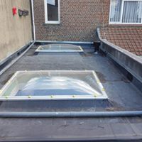 installatie koepels platdak West-Vlaanderen